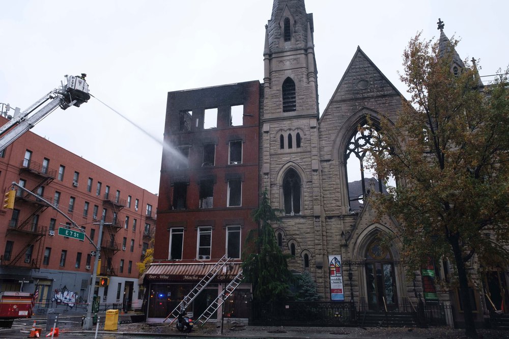 shutterstock_editorial_11184406h.jpg Firefighters extinguishing the six-alarm fire that destroyed the Middle Collegiate Church in NYC.