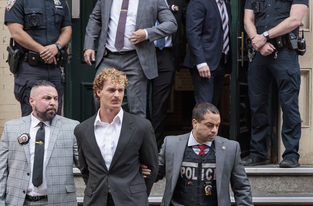 Daniel Penny is transported to an arraignment after surrendering himself at a New York City police precinct to face charges in the death of Jordan Neely in New York.