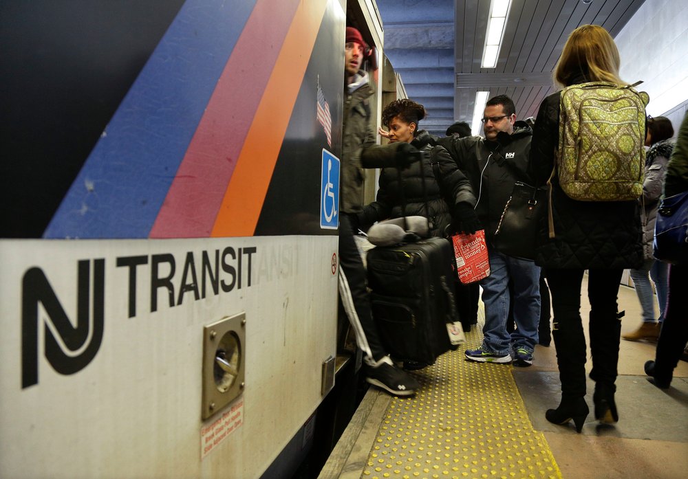 New Jersey Transit passengers board a train at Seacaucus Junction, 2016.