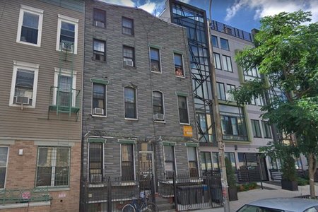 The Santiago family home in Bushwick, where police allegedly confiscated a memorial urn last year.