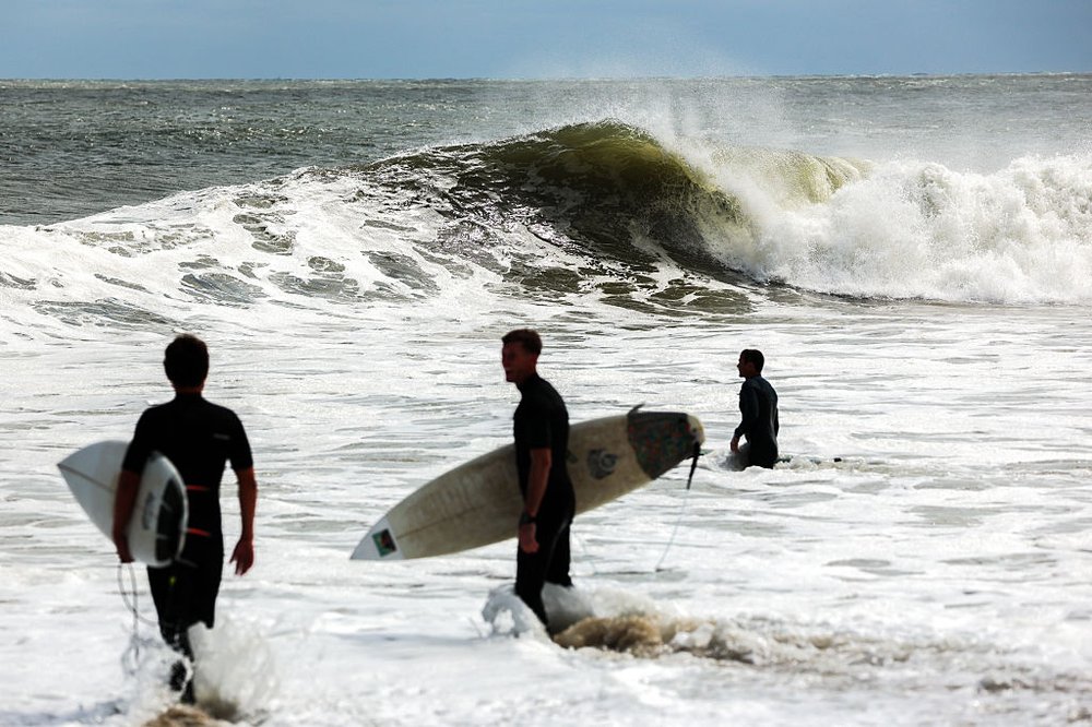 surfers in the Rockaways during Hurricane Erin