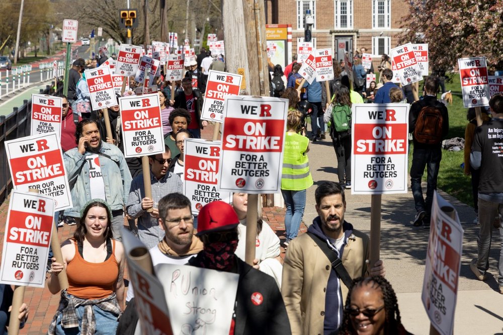 Rutgers faculty members and supporters protested at the school's College Avenue Campus Monday, the first day of the first faculty strike in the school's 256-year history.