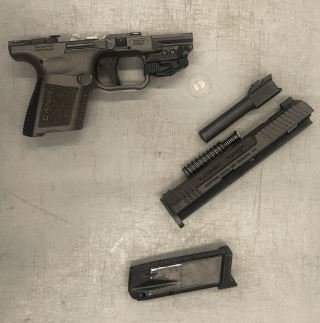 The TSA says parts of a disassembled 9mm handgun were scattered among plastic pieces inside a Black Panther LEGO box.