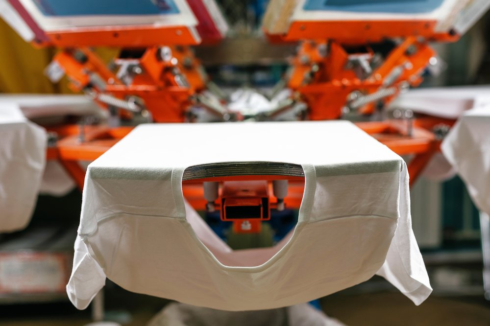 a t-shirt in a factory