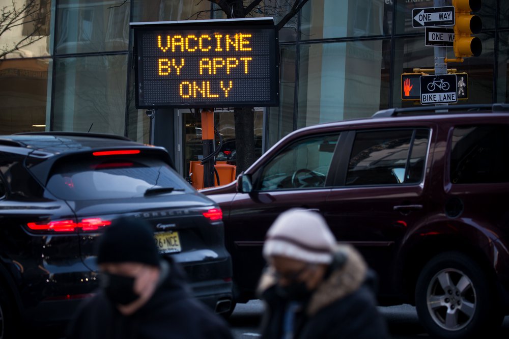 A sign advertising a COVID-19 vaccination site at the Javits Center
