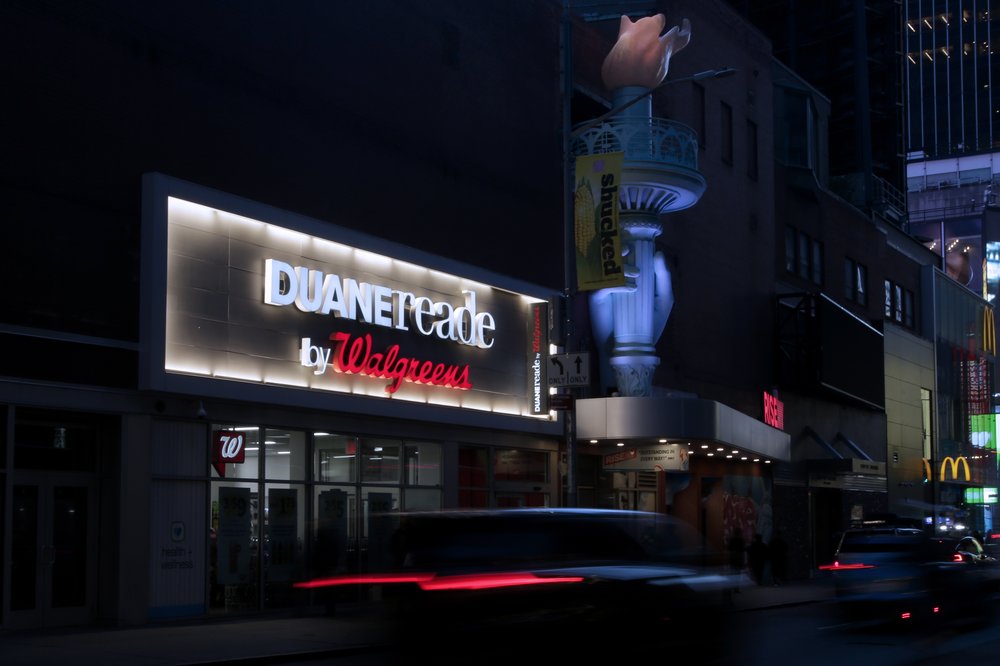 Cars drive near a Walgreens pharmacy on March 9, 2023 in New York City. Walgreens has sparked a political firestorm after stating that it will not dispense an abortion pill in 21 states where Republican attorneys general have threatened legal action against pharmacies that sell the medication.