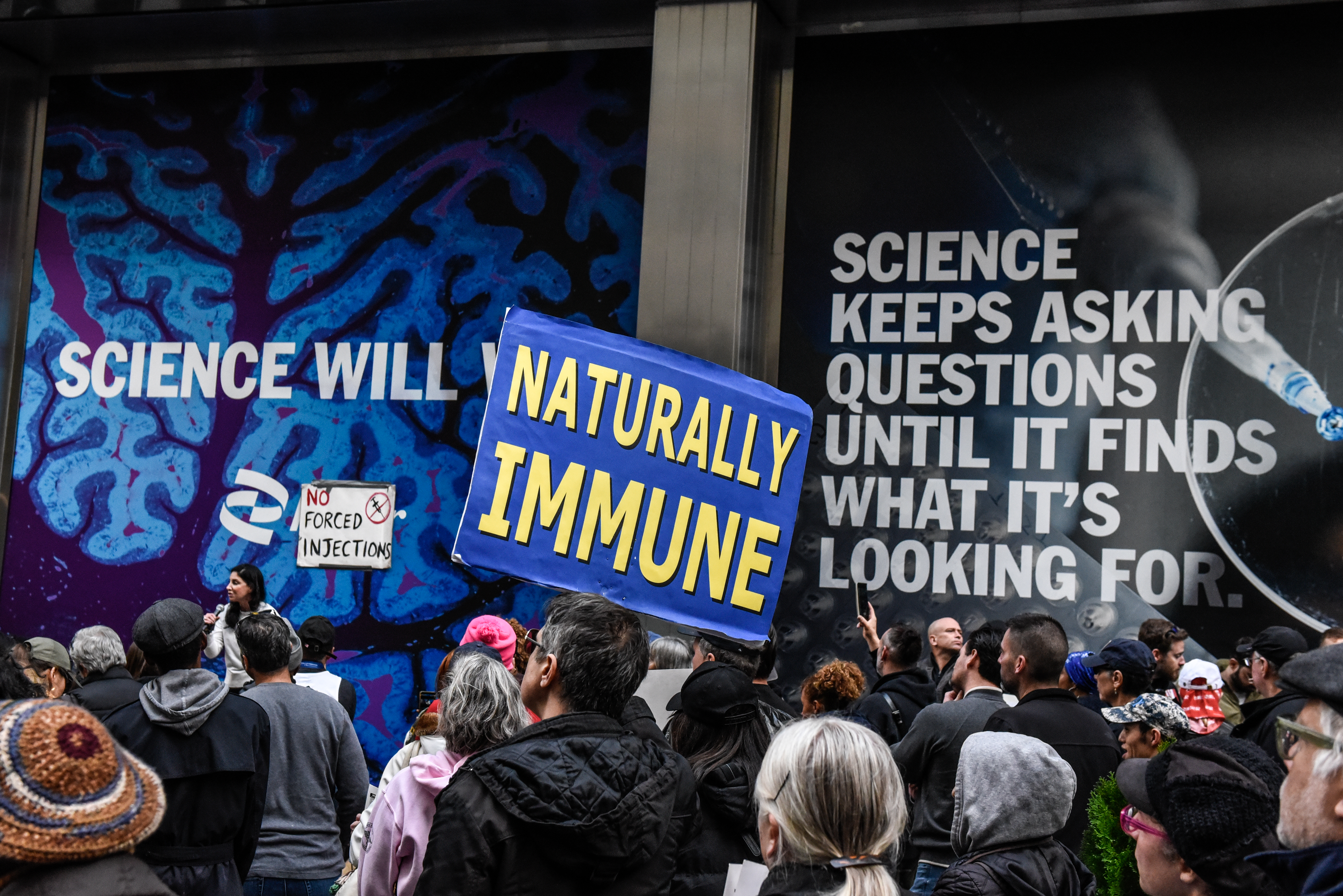 People against vaccinating for the COVID-19 virus protest in front of Pfizer world headquarters on Nov. 13, 2021.