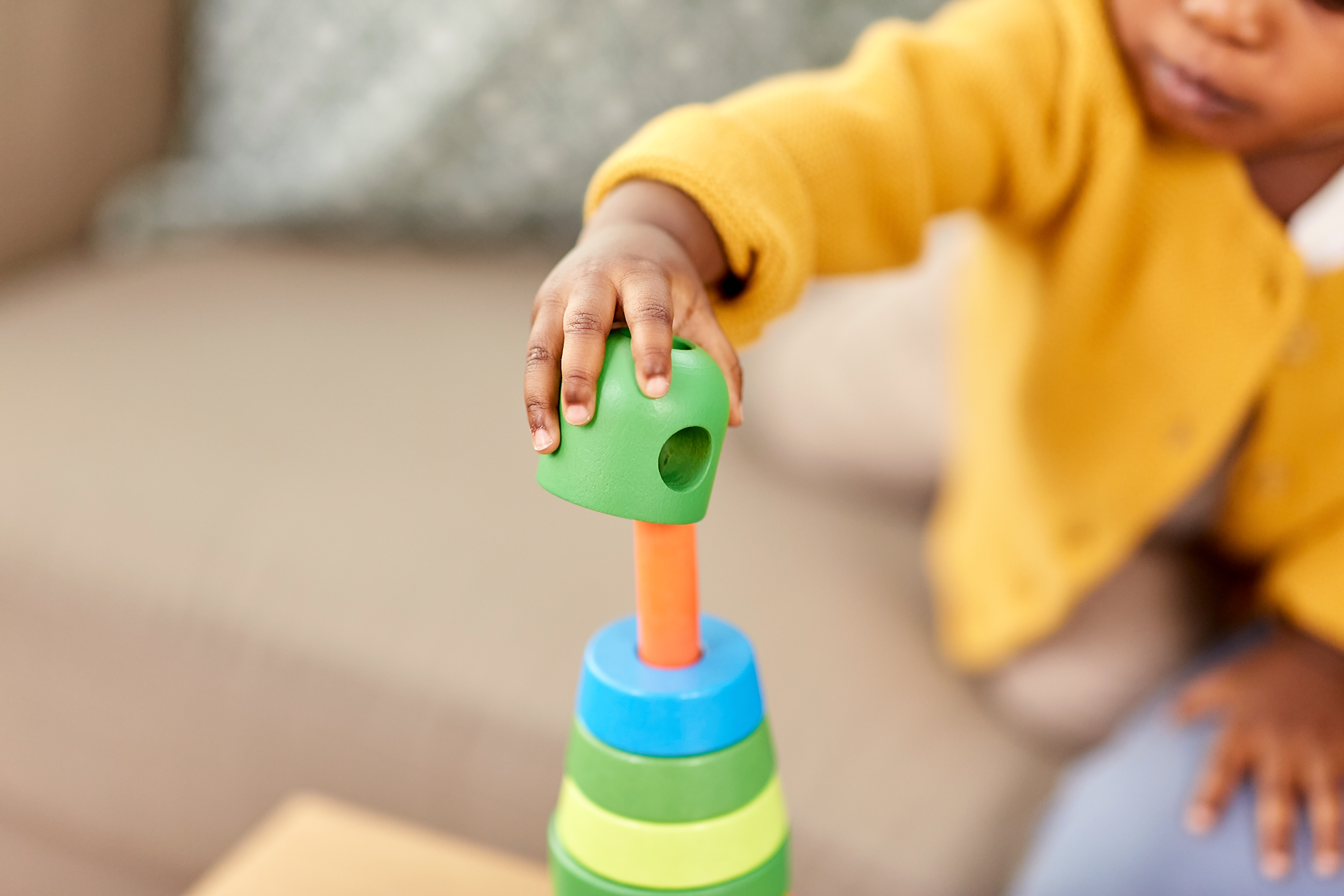 A child plays with blocks