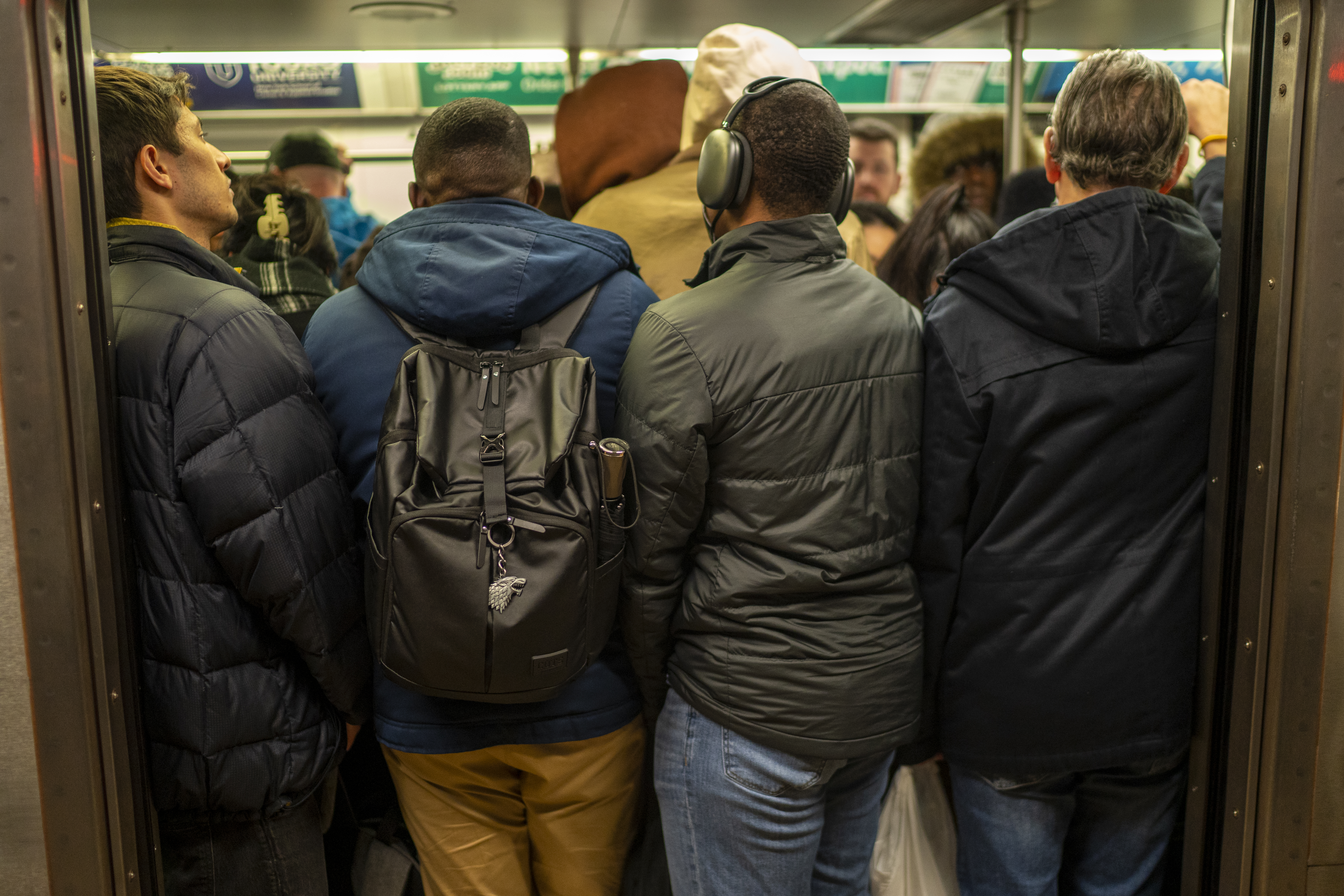 New York City subway riders pack a train during rush hour on March 27, 2024.