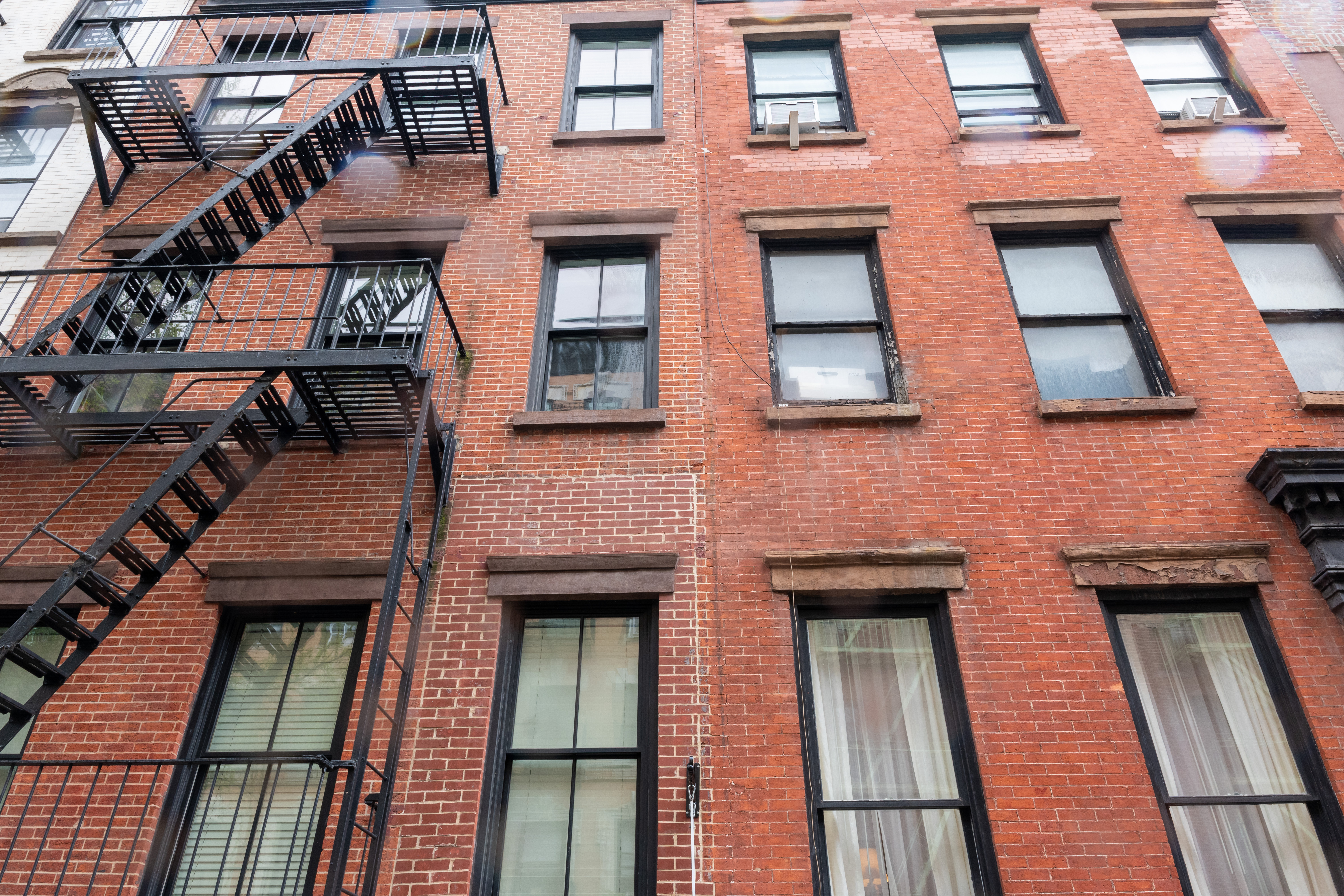 An apartment building with rental unit stands in Manhattan building on April 11, 2024.