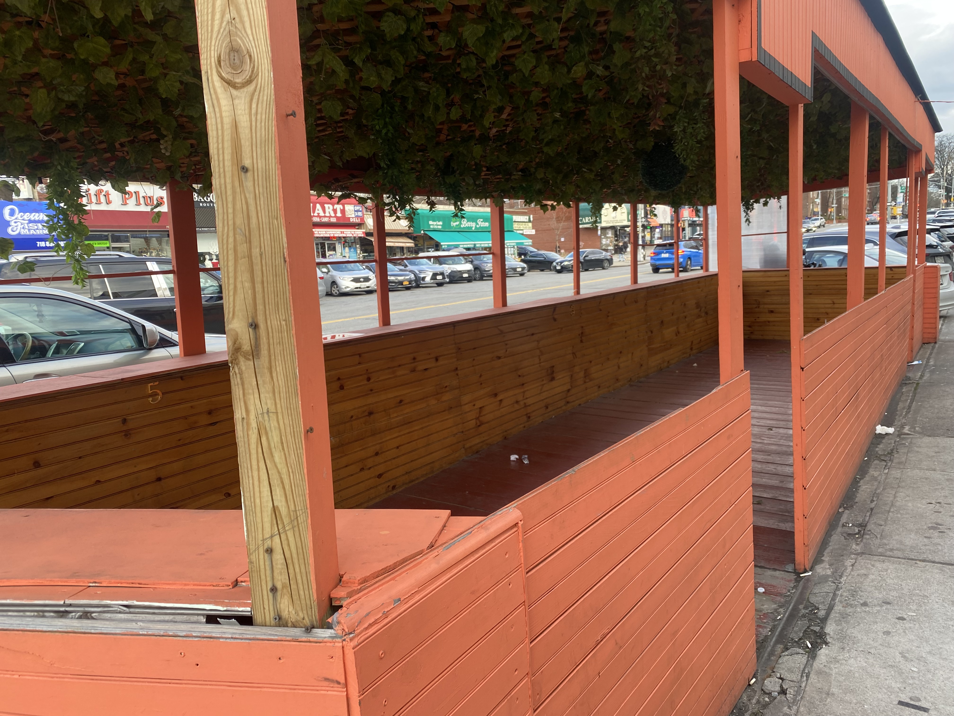 An empty outdoor dining shed in Queens.