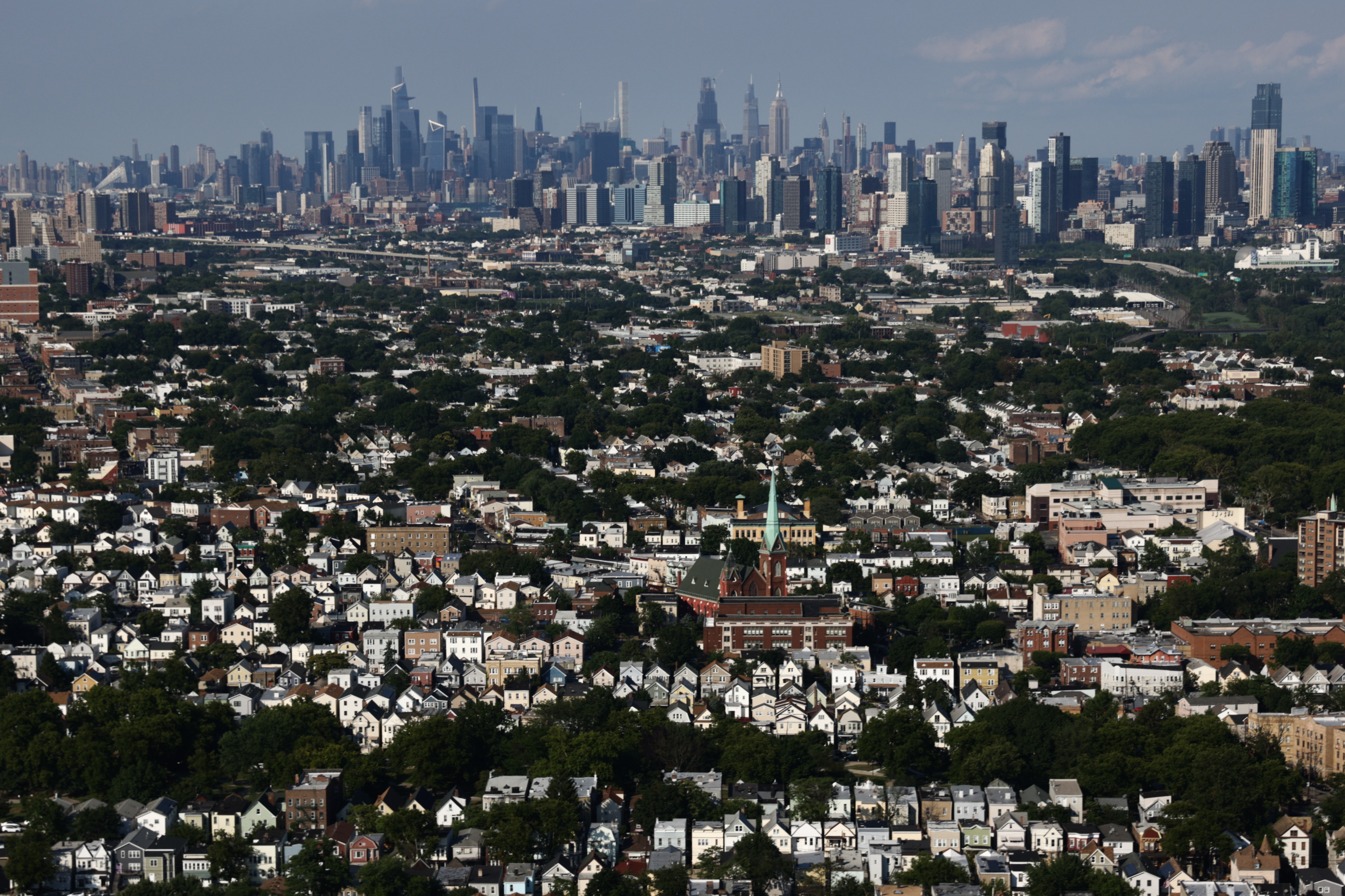 An aerial view of Manhattan and houses in Jersey City, United States on July 13, 2024.