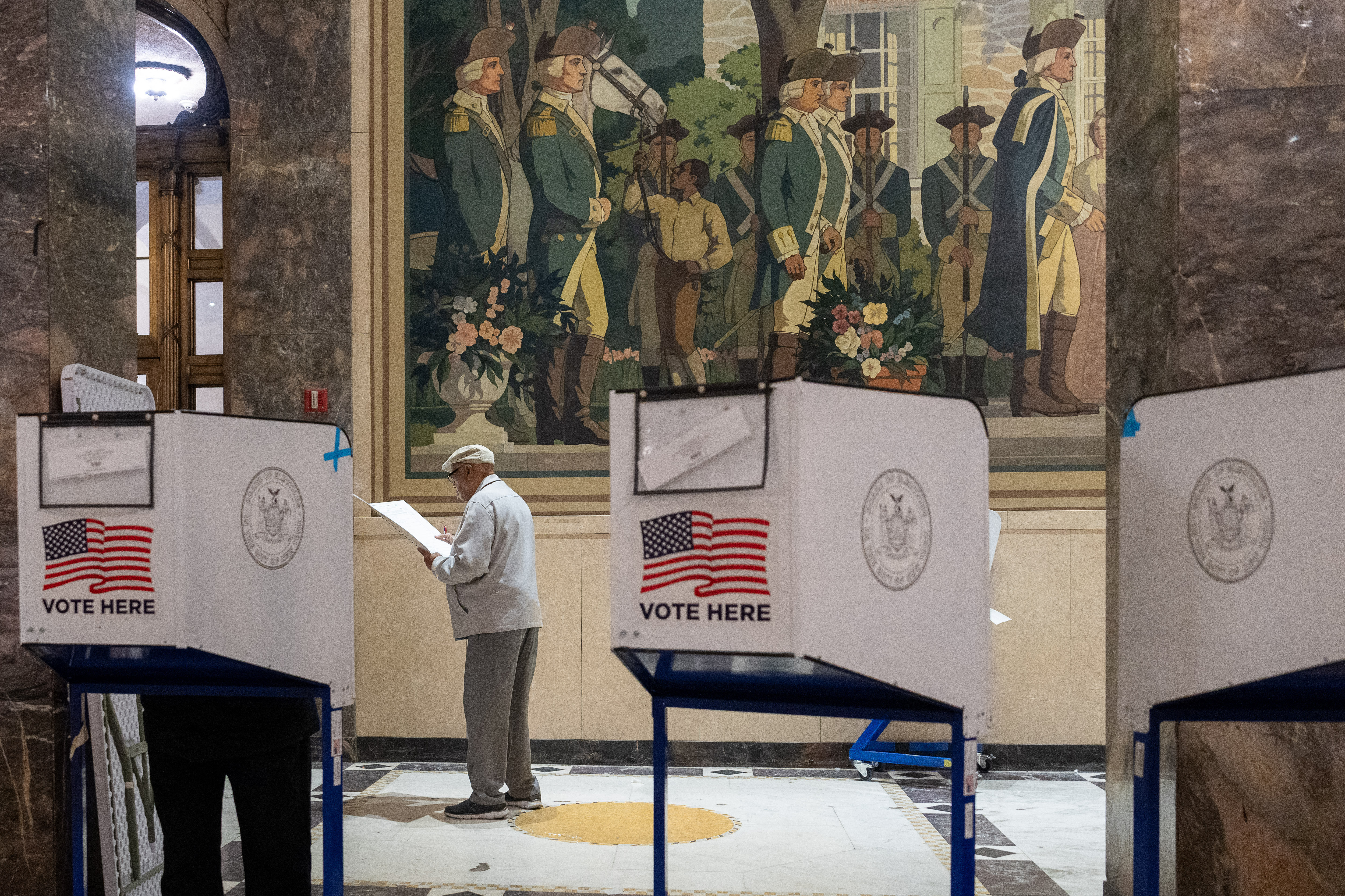 People vote in a Bronx building.