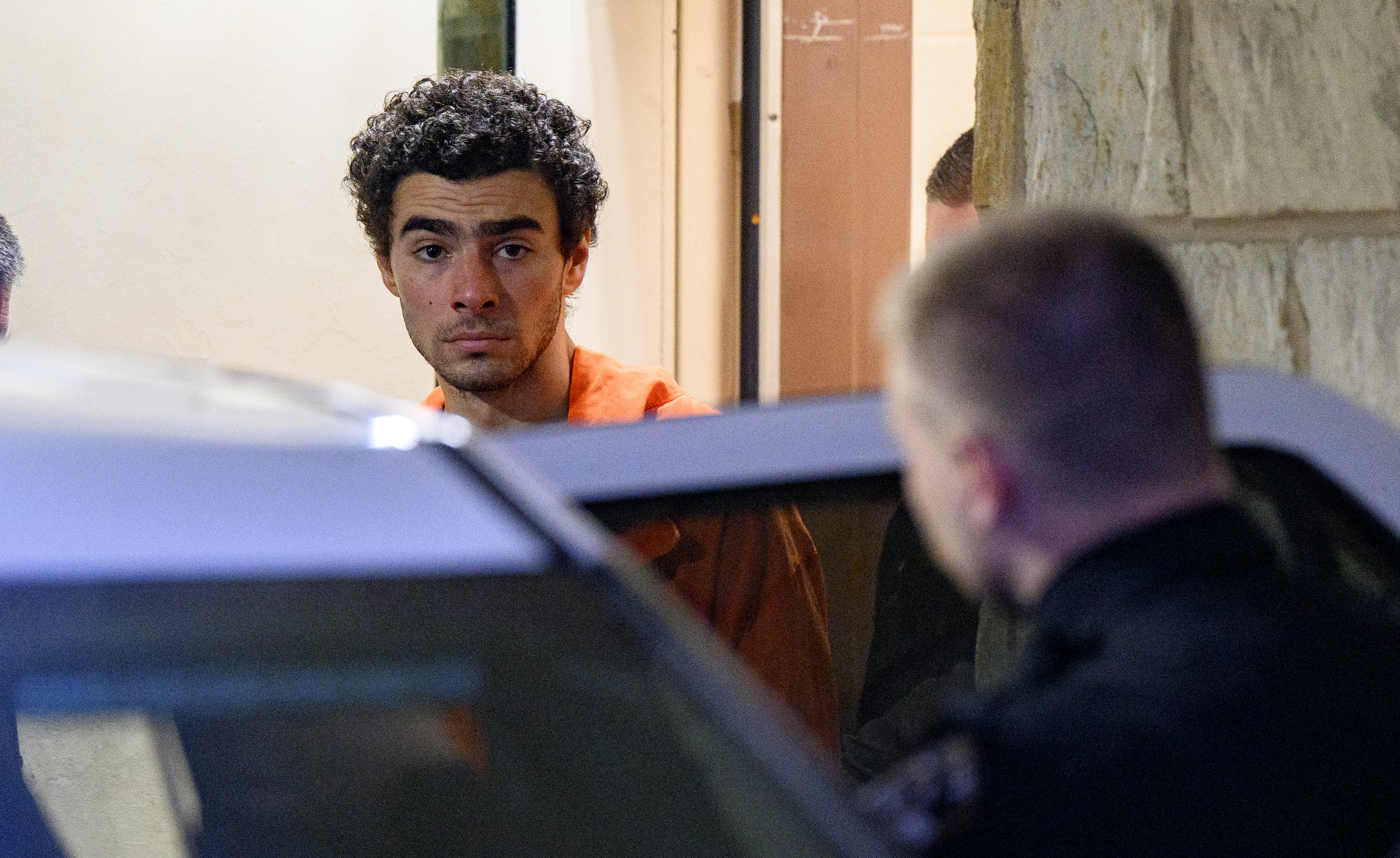 Luigi Mangione is led from the Blair County Courthouse after an extradition hearing Dec. 10