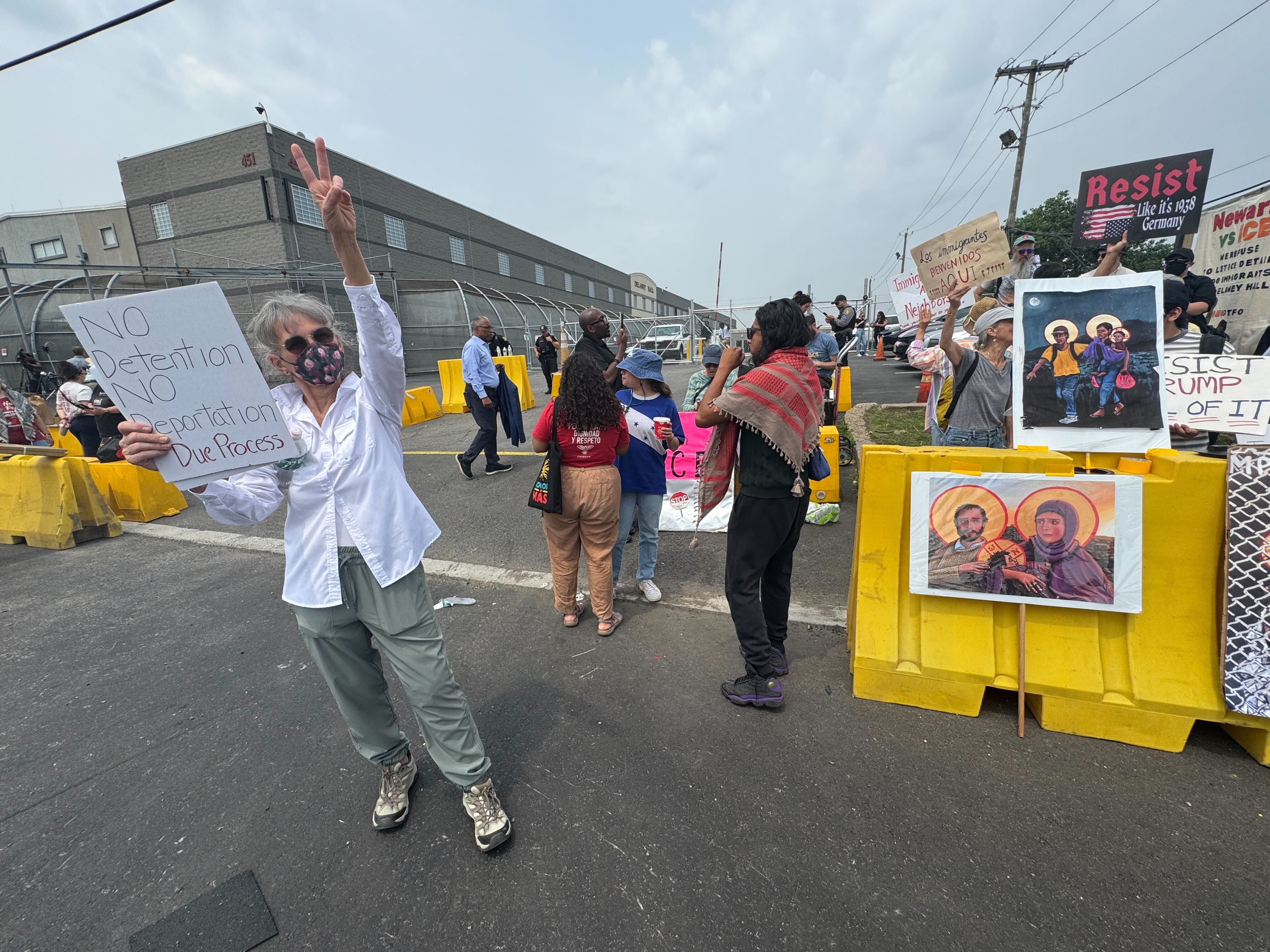 A photo of protesters outside Delaney Hall in Newark.