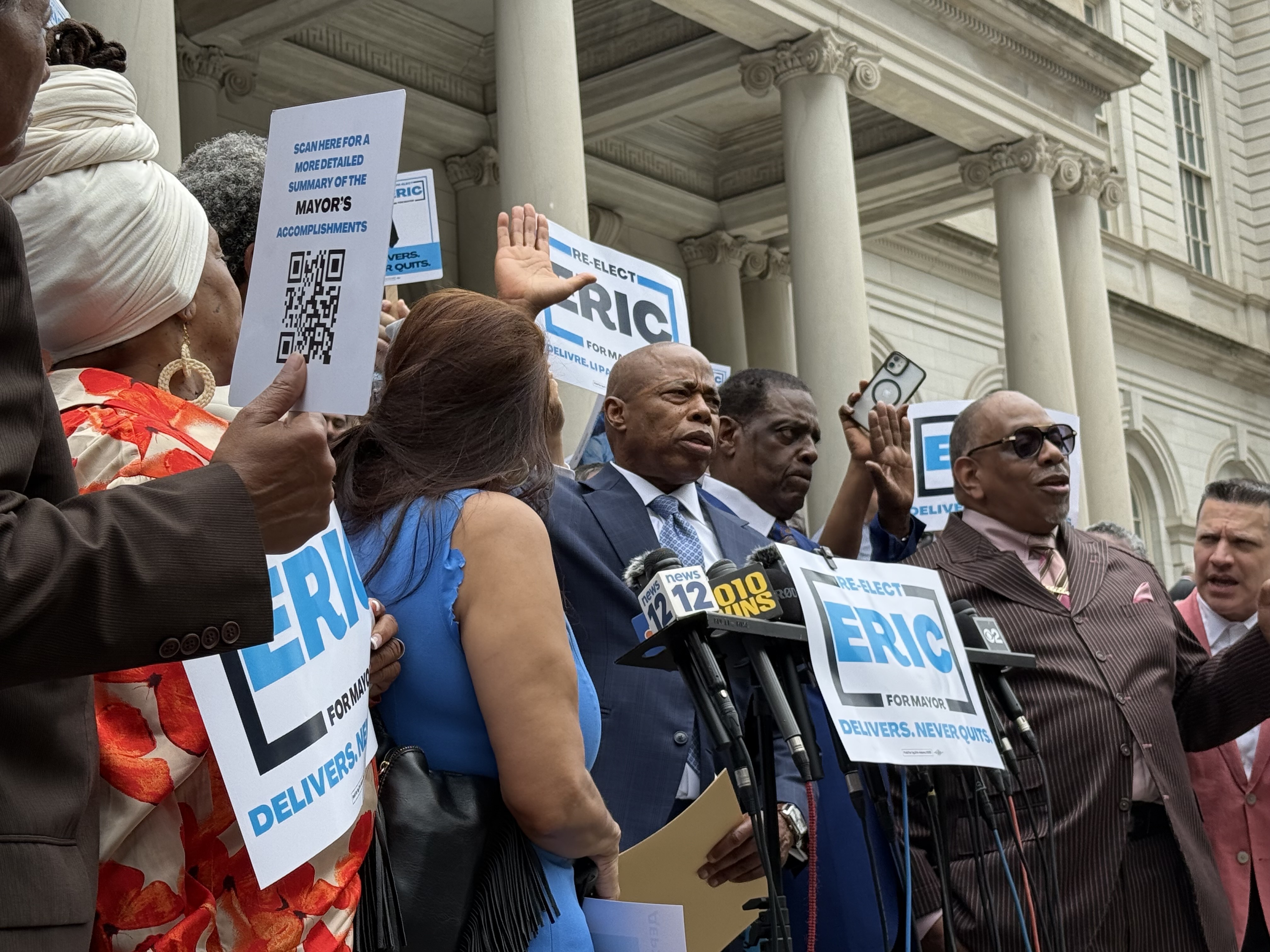 Flanked by aides raided by FBI, Mayor Adams launches reelection bid