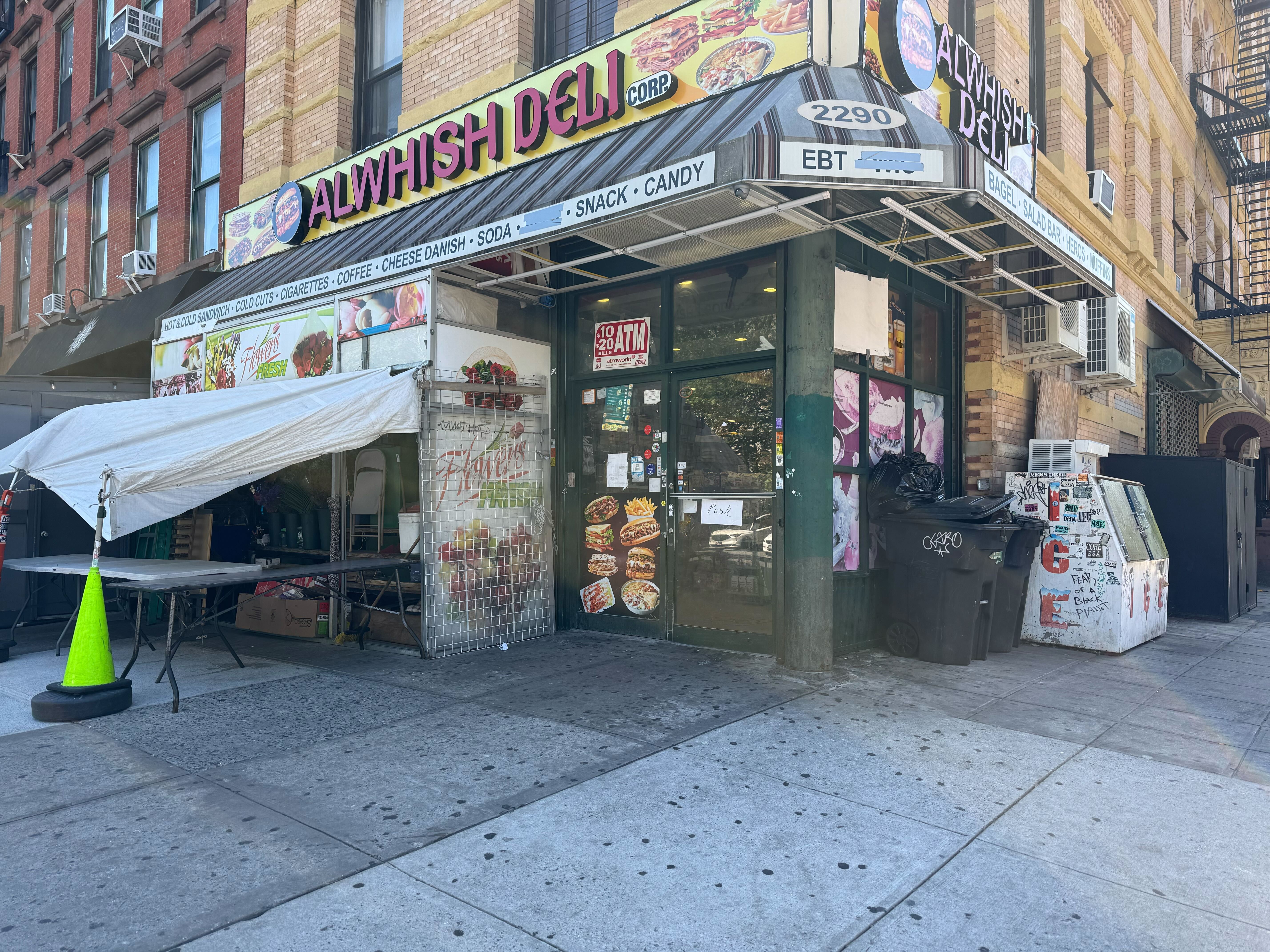 A deli at Frederick Douglass Boulevard and West 123rd Street in Harlem outside of which police say a man was shot to death on May 18, 2025.