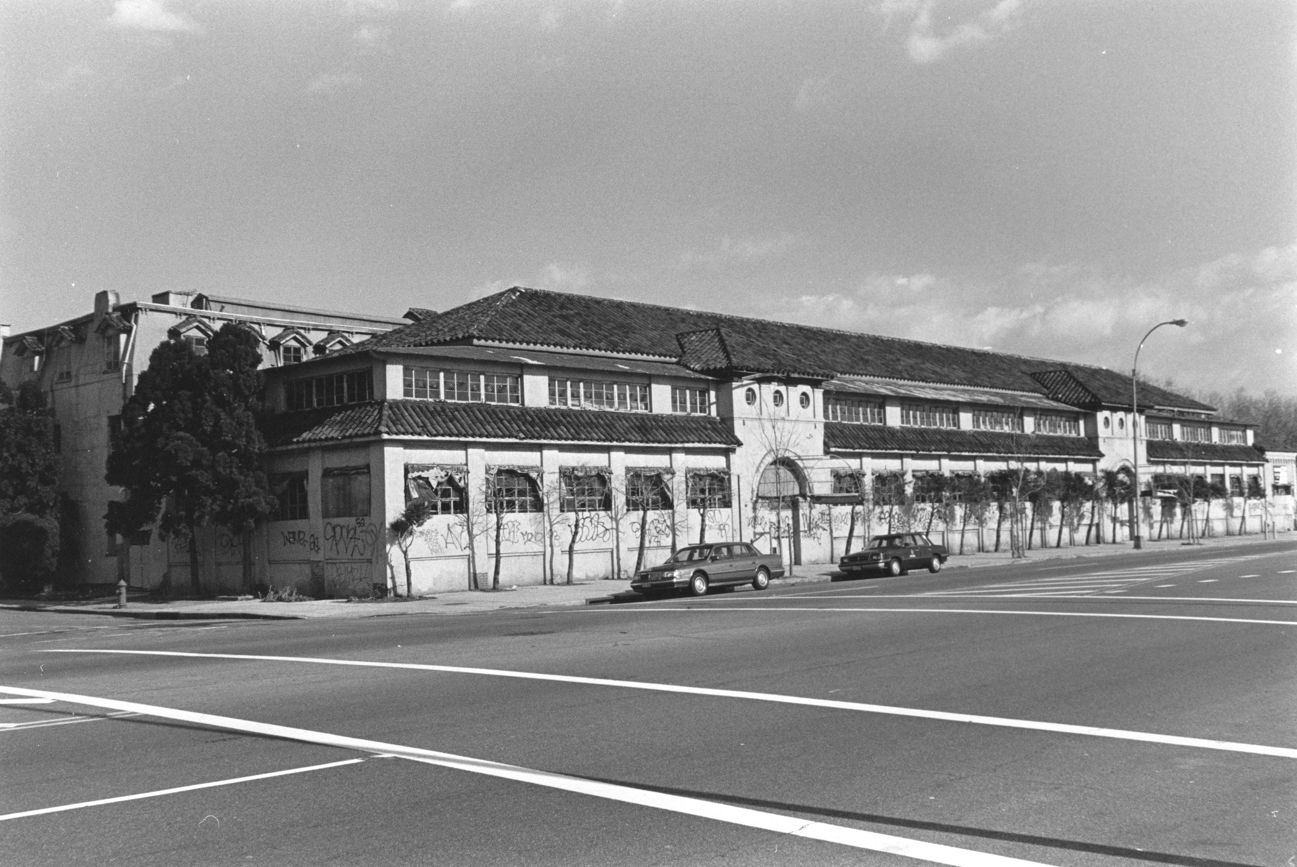 A large building pictured in a black and white photo.