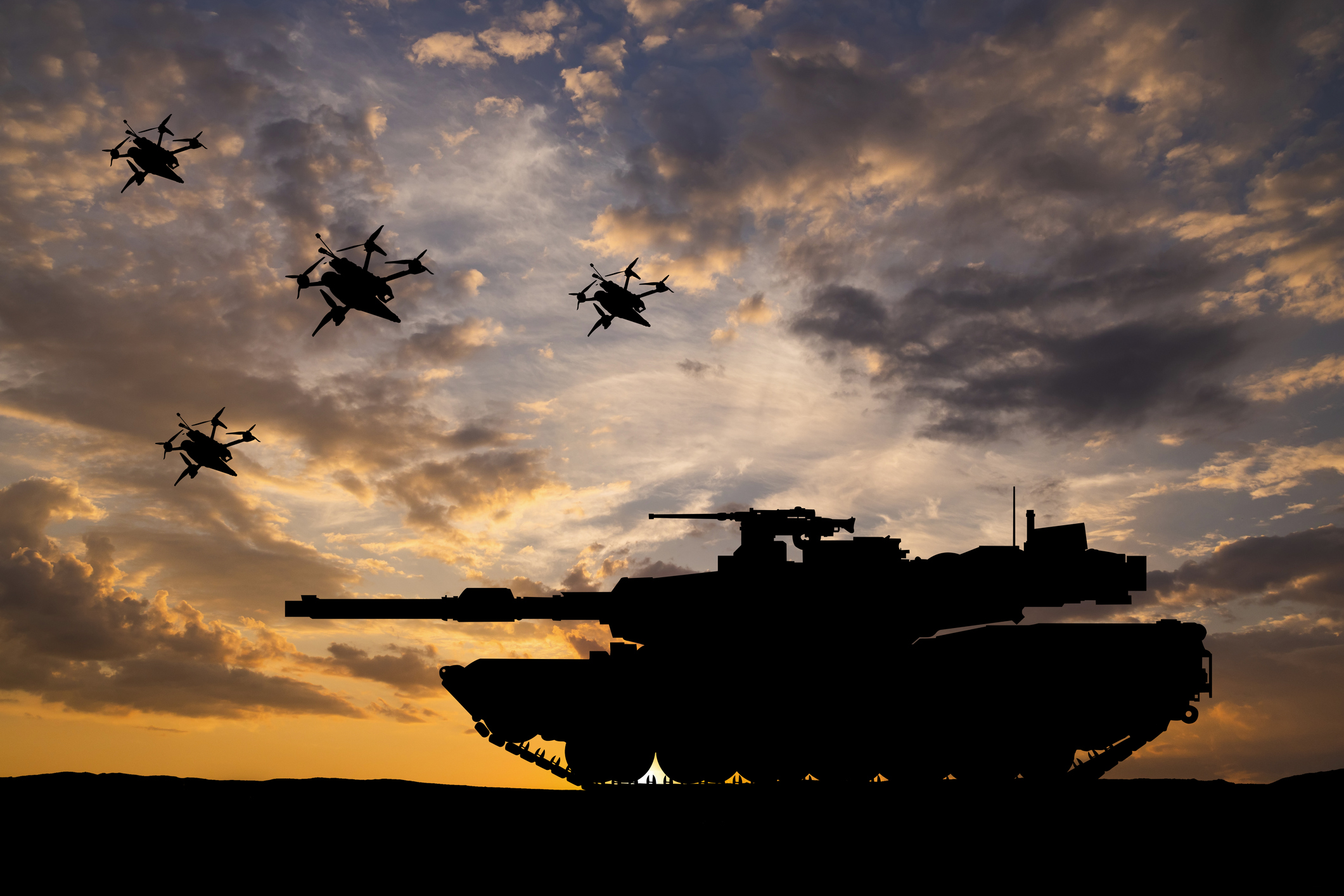 a tank with drones flying around it