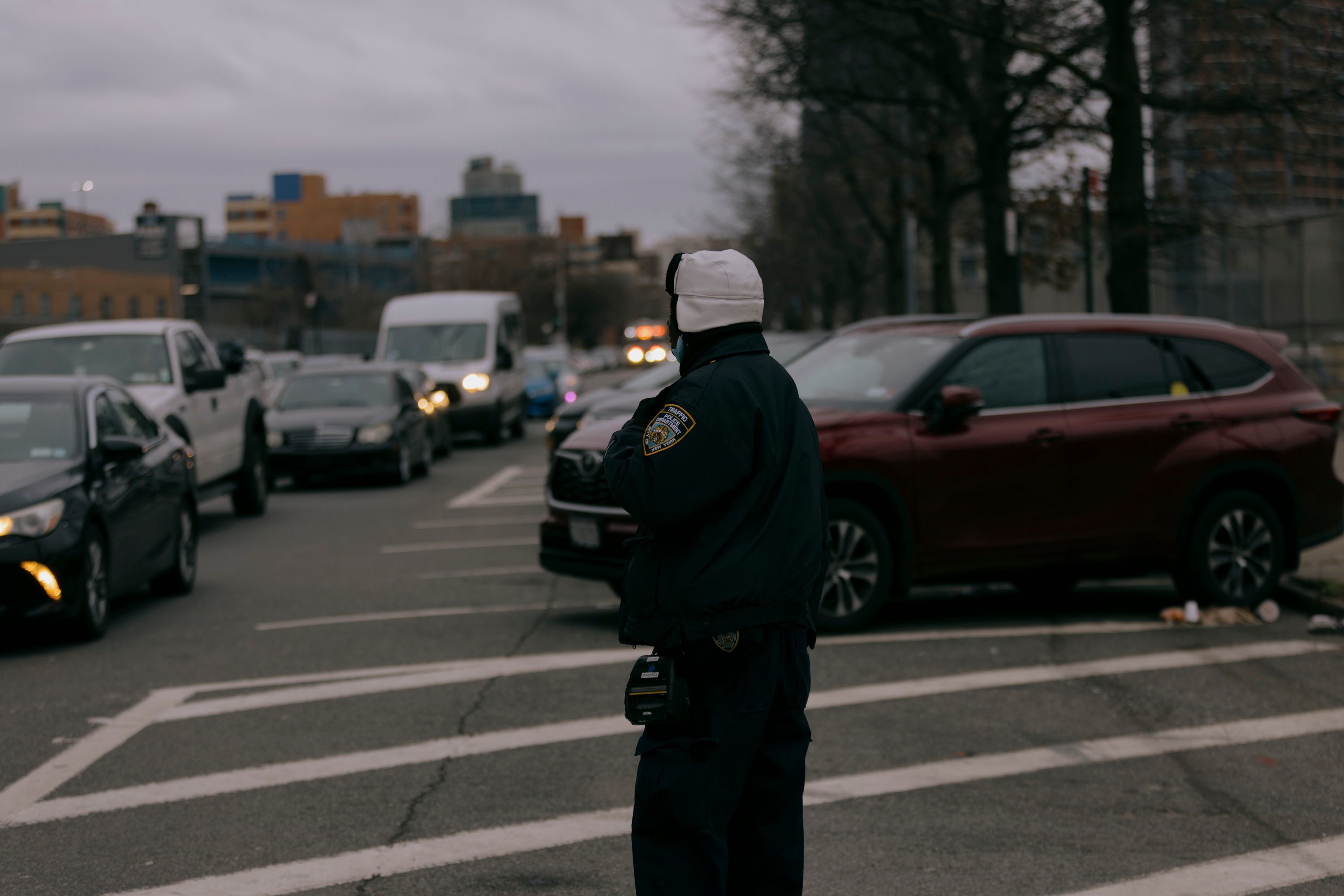 An NYPD traffic enforcement agent navigates traffic in the Bronx on March 7, 2024.