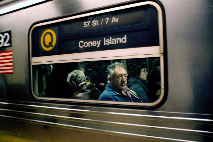 This is a photo of a Q train car in the NYC subway.