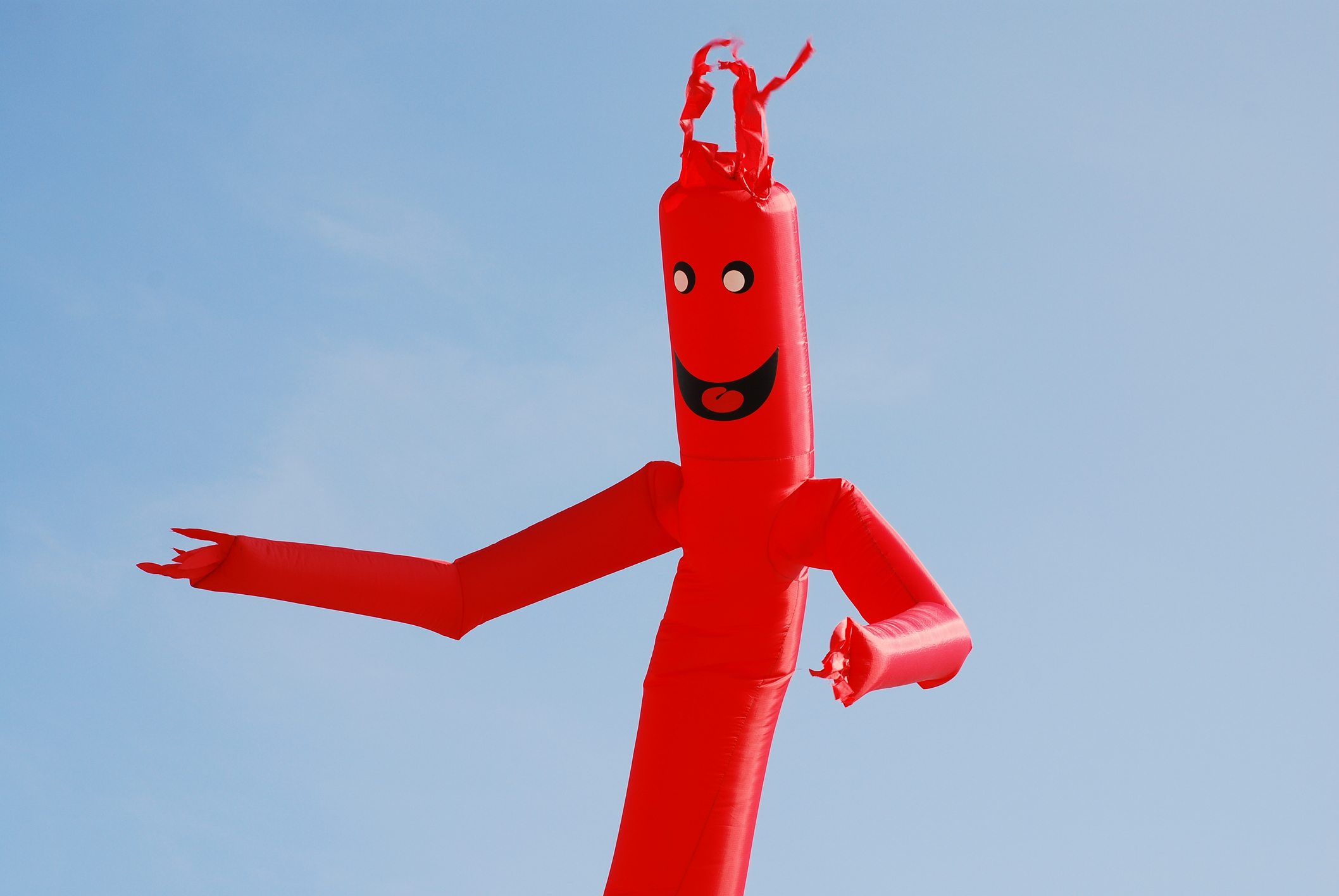 Inflatable tube guy outside a car dealership